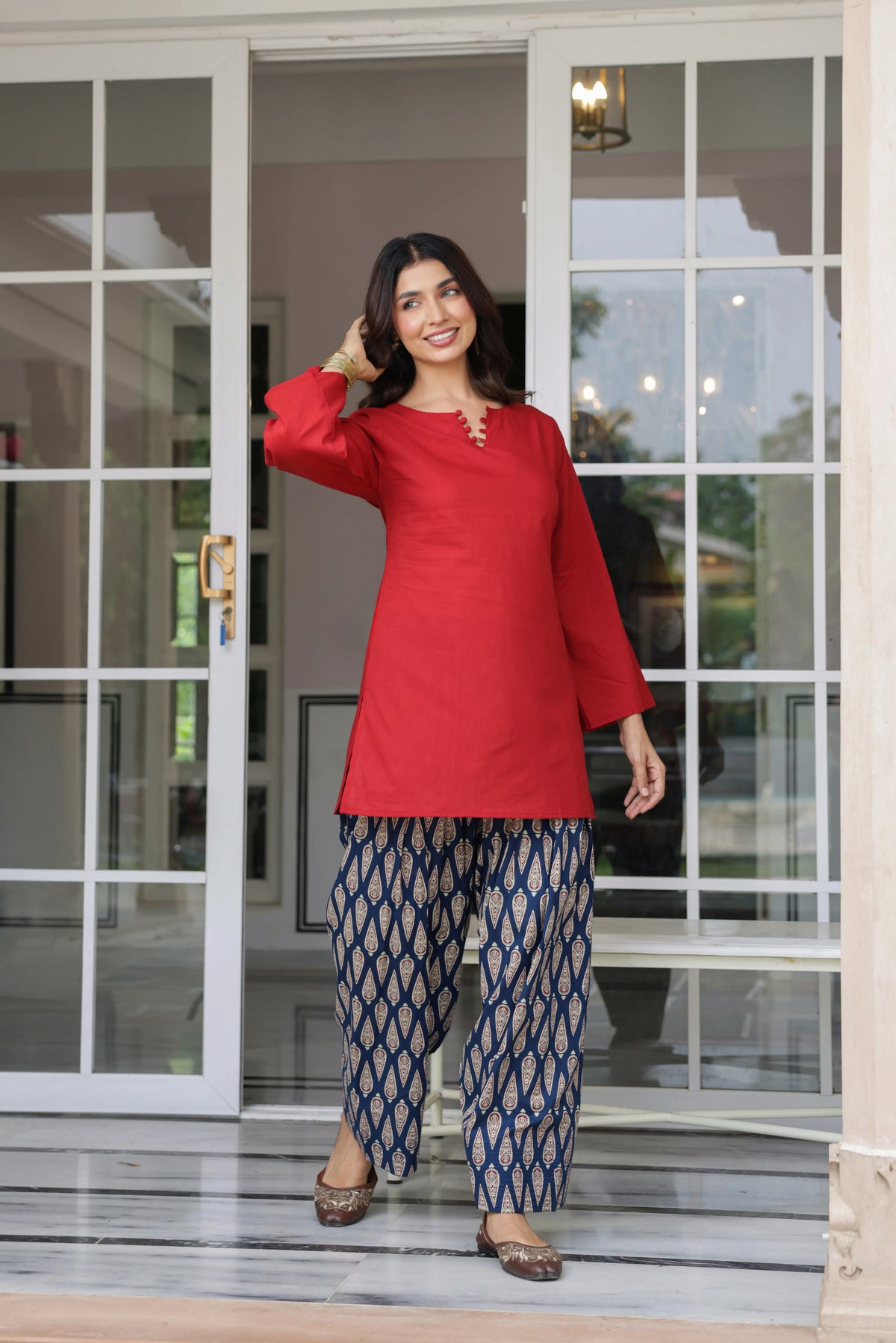 Rosalie red cotton kurta with navy blue paisley printed Farshi salwar for women by DhagaSaaga